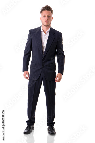 A man in a suit and tie posing for a picture, full figure shot, isolated on white in studio