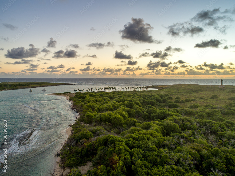 Petite Terre Islands are two small uninhabited islands located about 10 km to the south-east of the island of Guadeloupe in the Lesser Antilles with amazing lighthouse, giant turtles and iguanas
