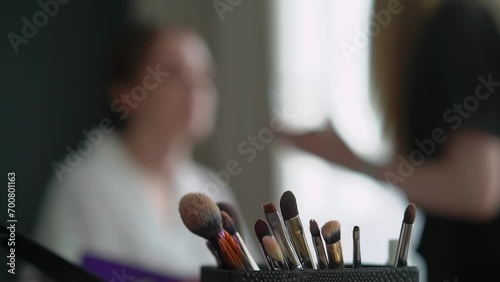 A close-up of a group of brushes for make up. Makeup artist tools. Beauty industry, decorative cosmetics and fashion. MUA. photo