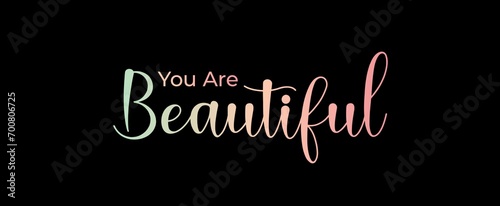 You are Beautiful handwritten slogan on dark background. Brush calligraphy banner. Illustration quote for banner, card or t-shirt print design. Message inspiration. Aesthetic design.