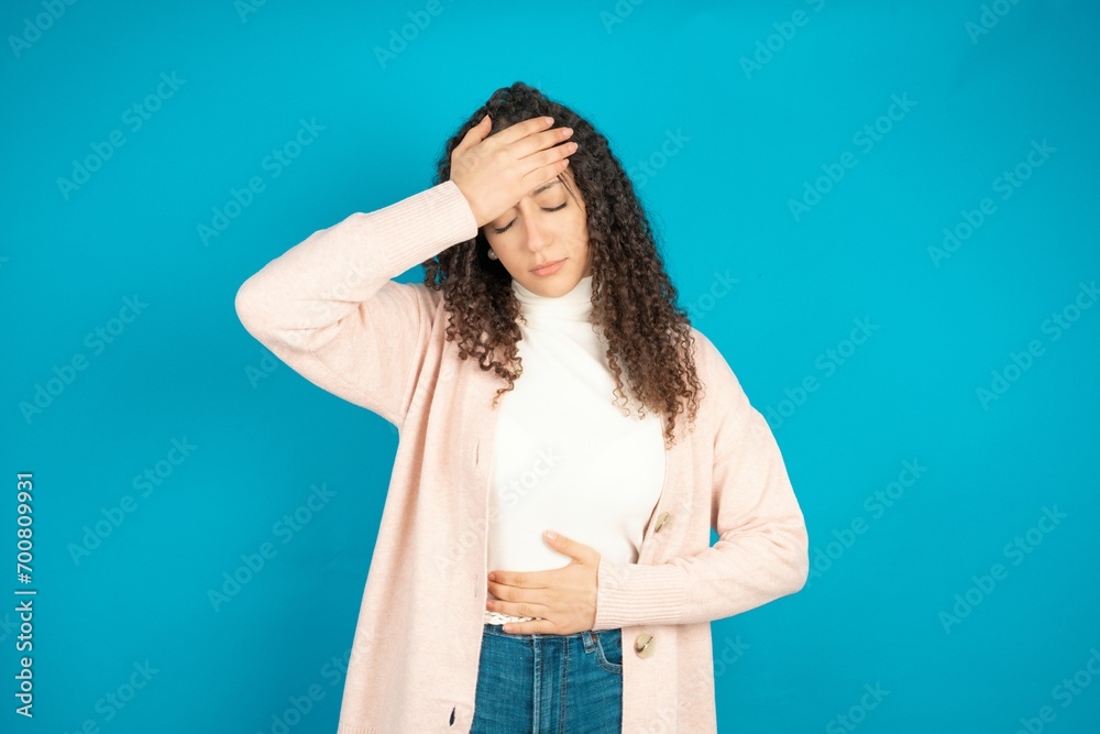 beautiful teen girl Touching forehead for illness and fever, flu and cold, virus sick. beautiful teen girl Touching forehead for illness and fever, flu and cold, virus sick.