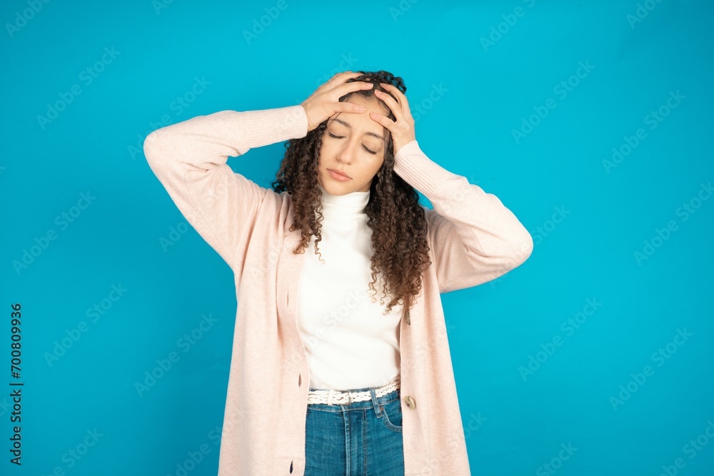 beautiful teen girl suffering from strong headache desperate and stressed because of overwork. Depression and pain concept. beautiful teen girl suffering from strong headache desperate and stressed because of overwork. Depression and pain concept.