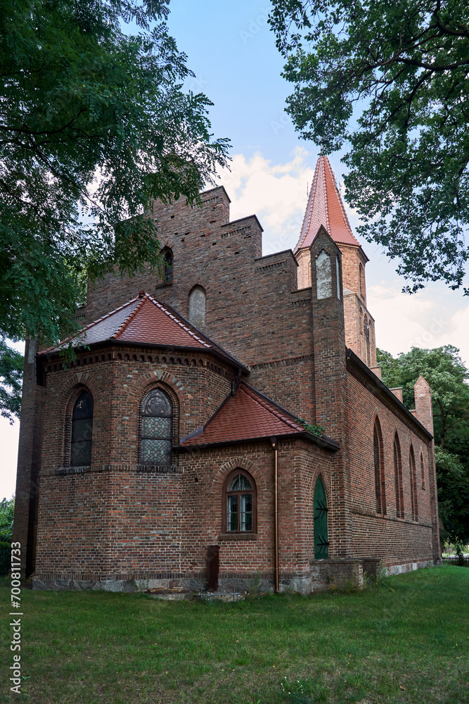 A historic, Gothic Roman Catholic church dedicated to the Sacred Heart of Jesus in the village of Wartoslaw