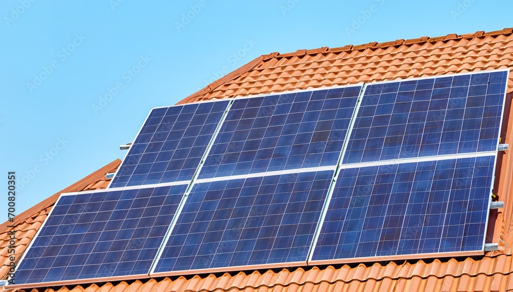 Solar panels installed on a roof. Alternative energy. Solar panels installed on a roof. Alternative energy.