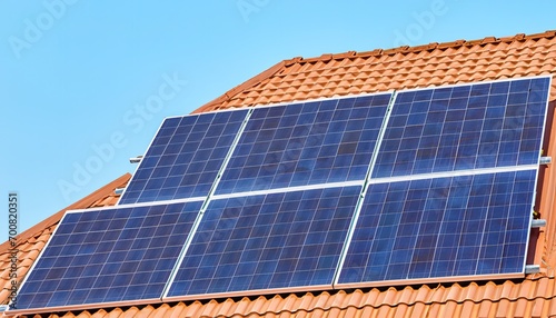 Solar panels installed on a roof. Alternative energy.