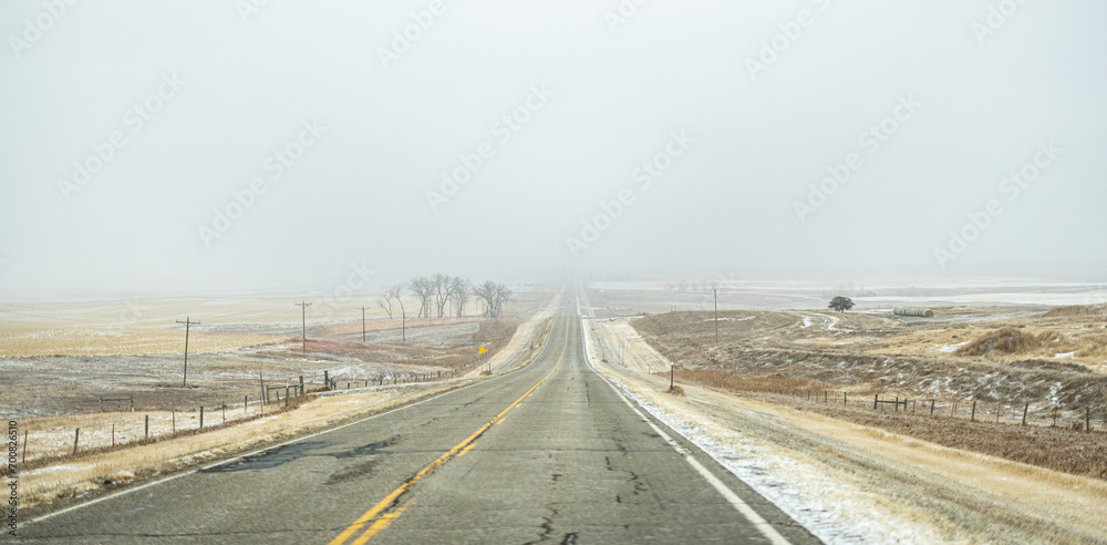 Driving down a snowy road in South Dakota