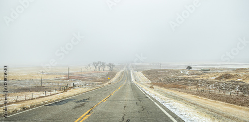 Driving down a snowy road in South Dakota