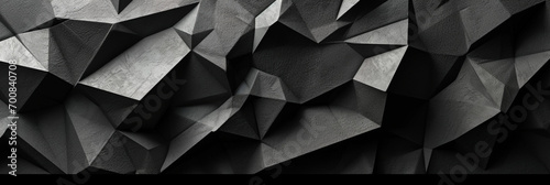 Fond d'un mur noir, texture ardoise, formes triangles, mosaïque. Ambiance sombre. Reflet et lumière. Arrière-plan pour conception et création graphique. 