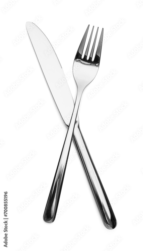 Shiny silver fork and knife isolated on white. Luxury cutlery Shiny silver fork and knife isolated on white. Luxury cutlery