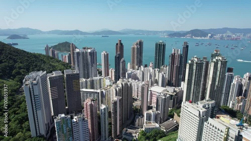 Pok Fu Lam Road, mixed forested and dense build areas on mountain slopes, connecting Aberdeen, Ap Lei Chau, Central and Sheung Wan in Hong Kong. Aerial drone Skyview from Kennedy Town to Cyberport  photo