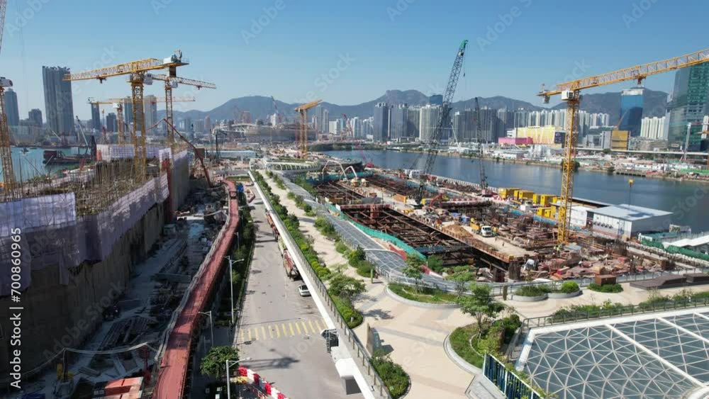 Seaside commercial and residential construction project in Kai Tak Sports Park Cruise Terminal Hong Kong Kowloon city, Kwun Tong and Kowloon Bay near Victoria harbor, Aerial drone skyview Seaside commercial and residential construction project in Kai Tak Sports Park Cruise Terminal Hong Kong Kowloon city, Kwun Tong and Kowloon Bay near Victoria harbor, Aerial drone skyview