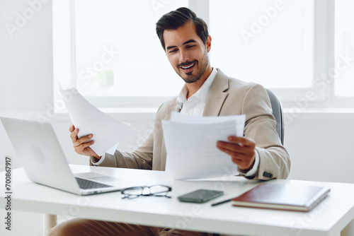 Office document suit company businessman paper happy laptop planning holding working job