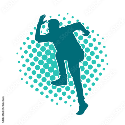 Silhouette of a man in dancing pose. Silhouette of a male dancer in performing pose.