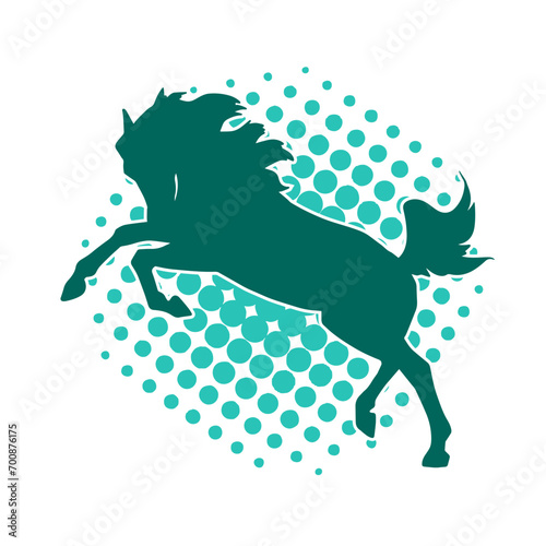 Silhouette of a horse standing on two hind legs. Silhouette of a stallion lifting front legs.