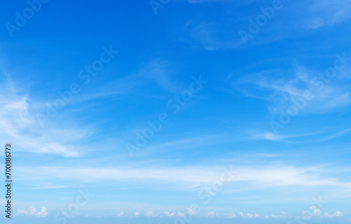 Fototapeta Naklejka Na Ścianę i Meble -  White сirrus clouds clear blue sky background, cirrostratus cloud, fluffy wispy clouds, cloudy skies texture, cloudscape backdrop, sunny heaven, cloudiness weather, overcast, ozone layer, copy space
