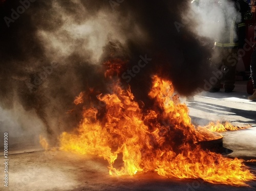 Abstract shapeless fire, large burning fire, simulation of large ignition in oil steel tray, used as basic firefighter training.