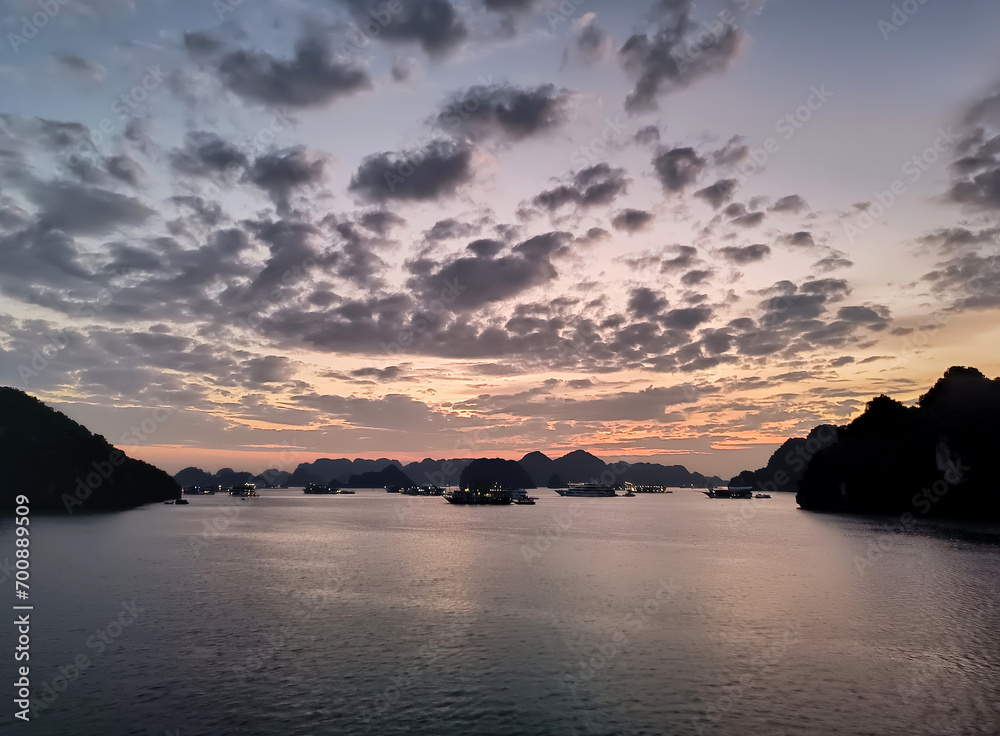 Vietnam, dawn in Ha Long Bay with clouds