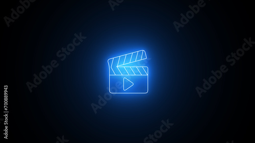 neon clapperboard icon. Glowing neon clapperboard with play sign. Movie Clapper Neon Sign. neon line Movie clapper icon isolated on black background. photo