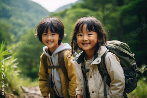 Sibling Adventure: Children Hiking in Lush Forest 
