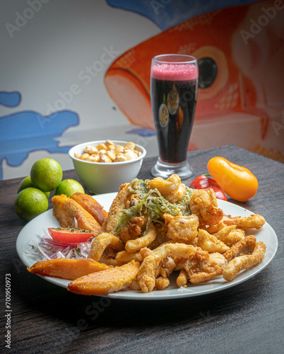 Fotografias de comida peruana marina, en una cevicheria tipica del Perú, donde se puede ver ceviche, arroz con mariscos, trio marino. photo