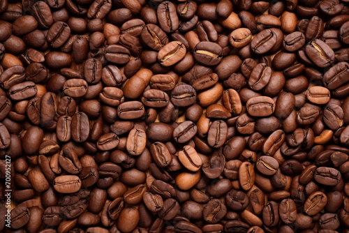 Abstract background showcasing the vibrant colors and textures of coffee grounds and beans