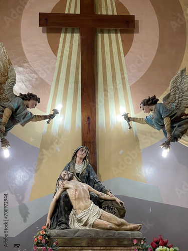 Saint Alfonso catholic church, Cuenca, Ecuador. Pieta and angels photo