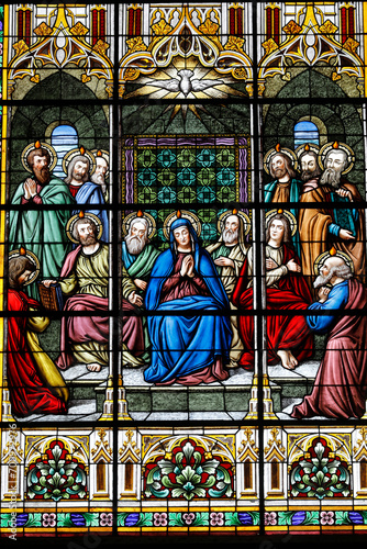 Basilica of the National Vow (Spanish: BasÃ­lica del Voto Nacional), Roman Catholic church located in the historic center of Quito, Ecuador. Stained glass depicting Mary's Assumption. photo