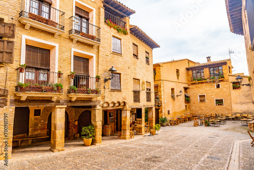 Rafael Ayerbe Square. Old Plaza Mayor of the Pyrenean town of Alquezar, Huesca, Spain photo