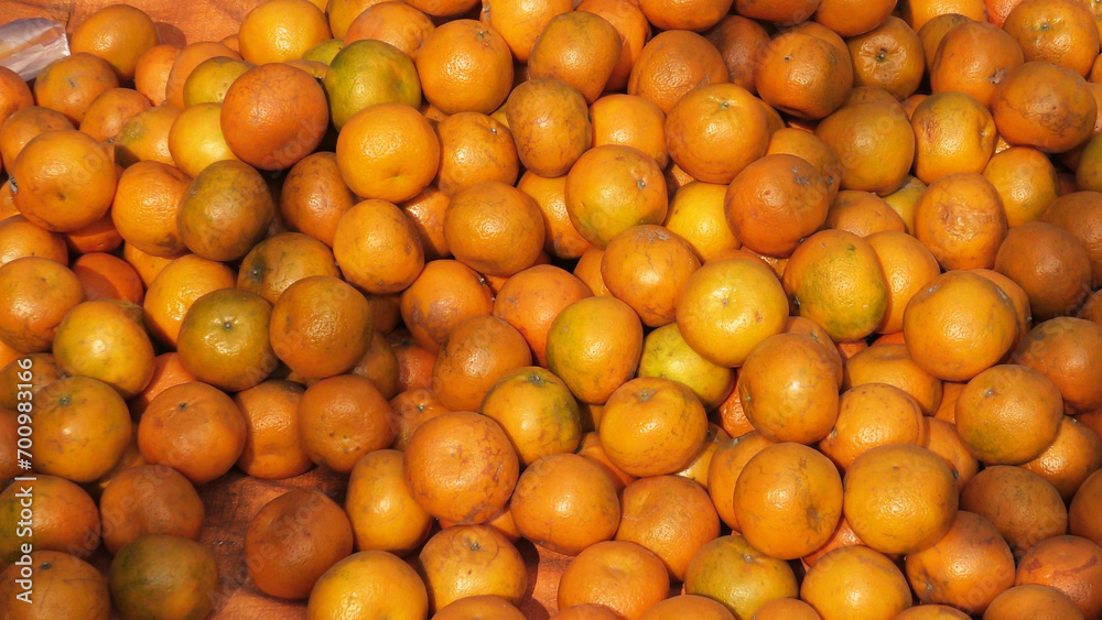 Fresh orange fruits displayed for sale Fresh orange fruits displayed for sale