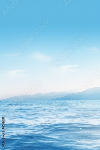 A Serene Lake Reflecting the Clear Blue Sky