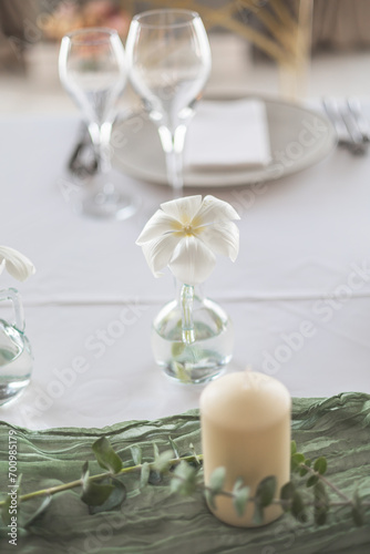 Wedding or event table decorated using white flowers