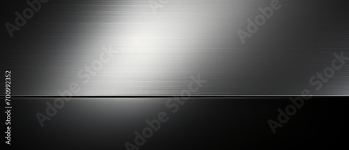 Abstract metallic background with a sleek brushed steel texture.