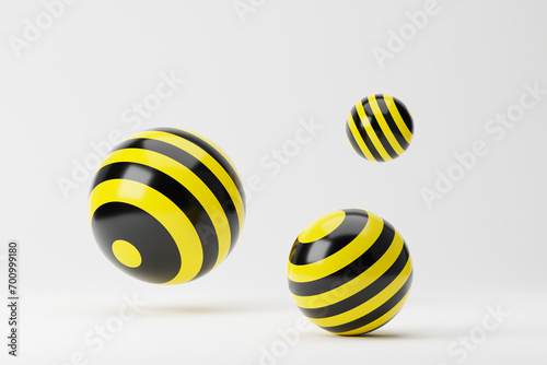 Yellow balls or geometric spheres with black stripes isolated over white background. Minimalistic concept. 3D rendering.