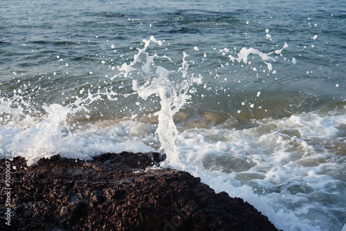 Abstract formation of waves on Devgad beach of Western India. photo