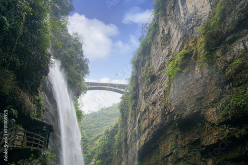 Lush vegetation and waterfalls. Bridges across canyons, cable cars in the sky. Enshi Yunlong Gorge is a 