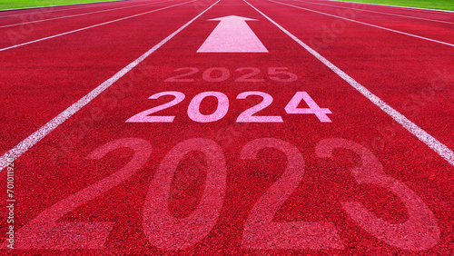 Athletics track road with New year 2024 concept. Direction to new year concept and sustainable development idea for goal and success, concept for vision 2023-2025.