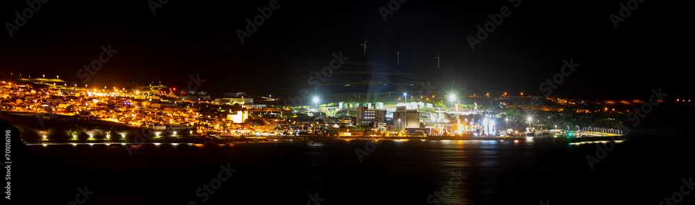 a panorama of a city on madeira island at night