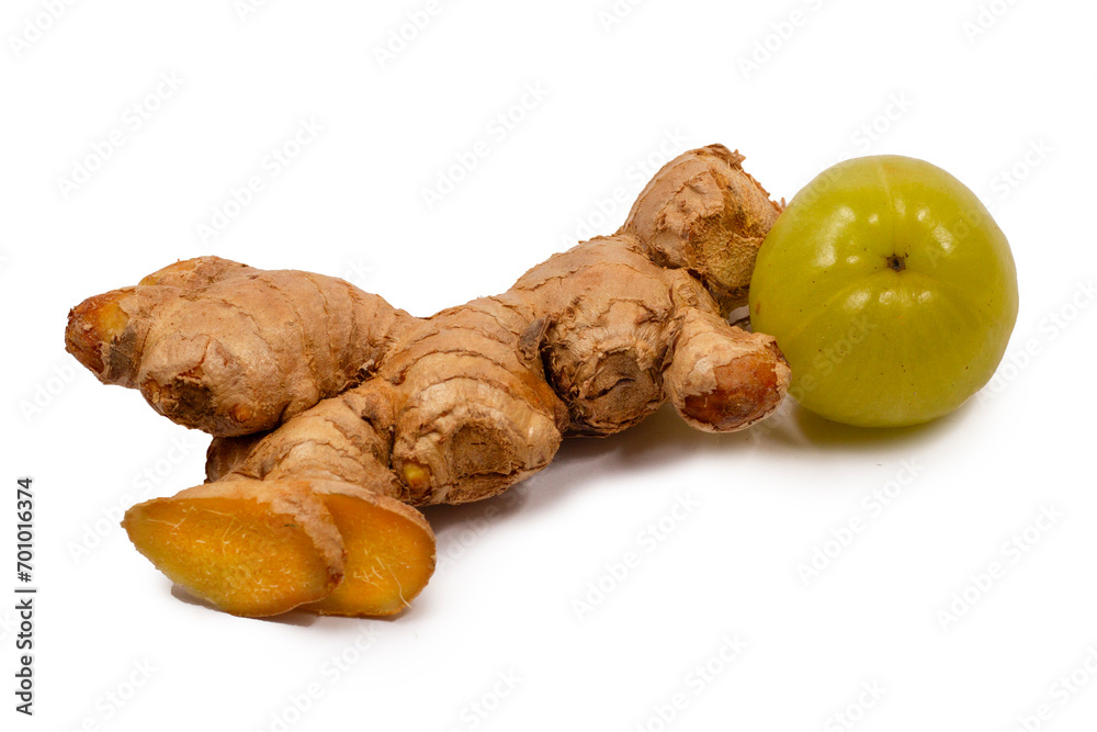 Amla and Fresh Ginger on white background, herb medical concept Amla and Fresh Ginger on white background, herb medical concept