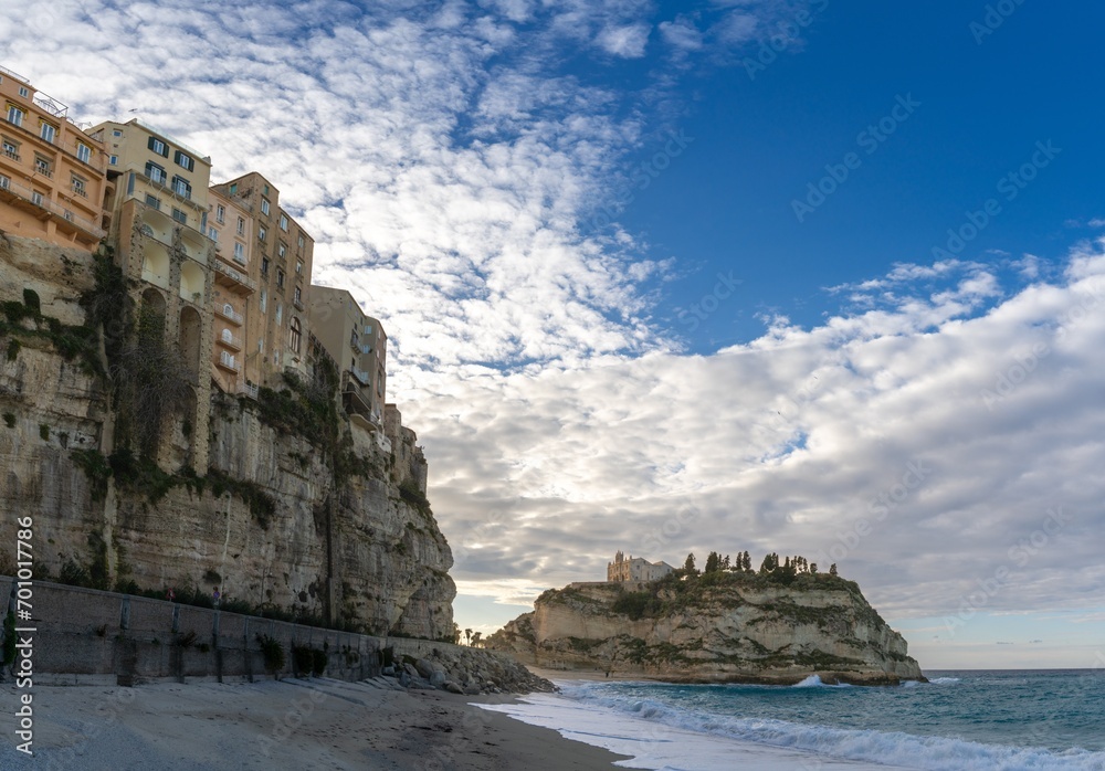 view of Rotonda Beach and the colourful old town of Tropea in Calabria