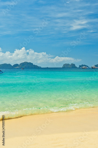 PALAWAN, PHILIPPINES - DECEMBER 21, 2023: Beach landscape in Palawan island, Philippines. Seven Commandos Beach.. 6 million foreign tourists visited Philippines in 2016.