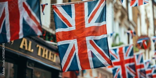 Street adorned with Union Jack flags in preparation for national holiday festivities. photo