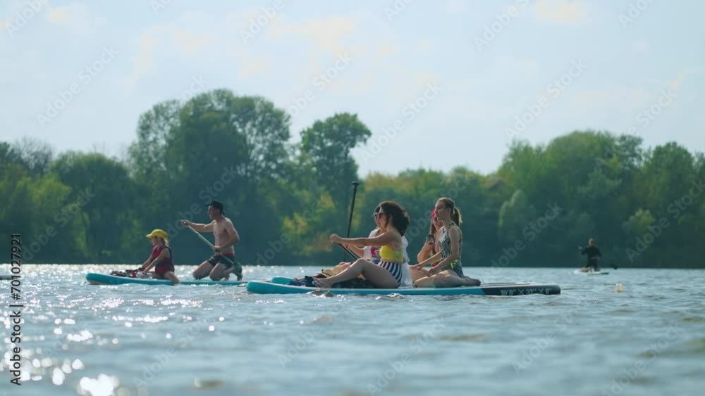 Paddle Board Trip In Summertime, Group Of Athletic People Floating By Inflatable Boards On River