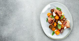 salad of fresh colored cherry tomatoes with olive oil and balsamic vinegar. Long banner format. top view