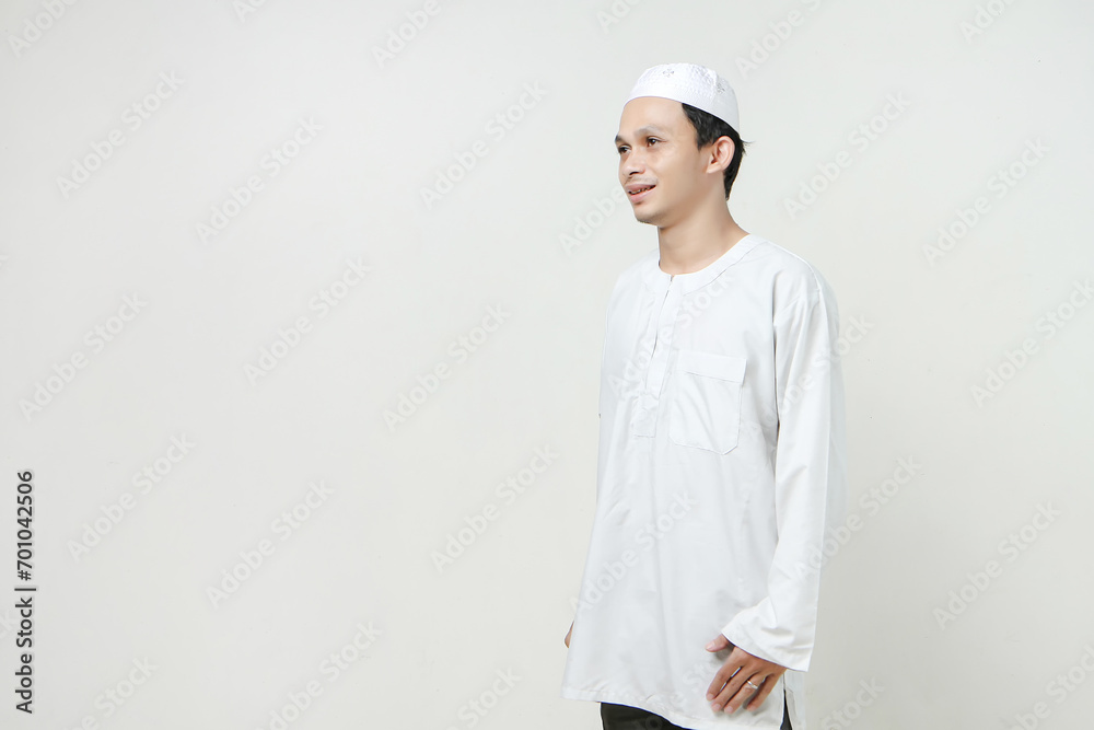 Asian Muslim man portrait on isolated background. People religious Islamic lifestyle concept Asian Muslim man portrait on isolated background. People religious Islamic lifestyle concept