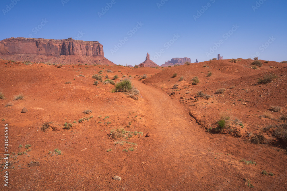 hiking the wildcat trail in monument valley, arizona, usa hiking the wildcat trail in monument valley, arizona, usa