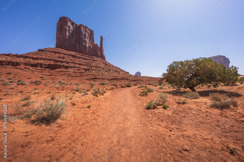 hiking the wildcat trail in monument valley, arizona, usa