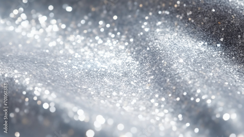 Silver glitter fabric, shiny silver fabric with sequin,  sparkly fabric background with bokeh light, luxury fabric, close-up shot of waves of fabric photo