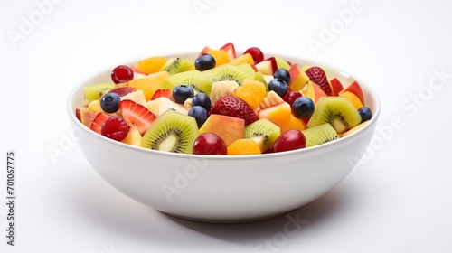 a refreshing fruit salad, featuring an assortment of juicy fruits against a clean white background, inviting a healthy and delightful experience. © Khan