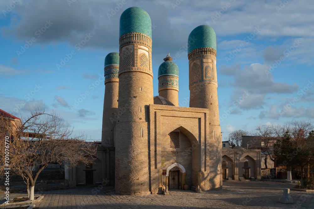 Madrasah of Khalif Niyaz-kul (Chor Minor) is a Central Asian madrasah in the historical center of Bukhara on a sunny day, Bukhara, Uzbekistan