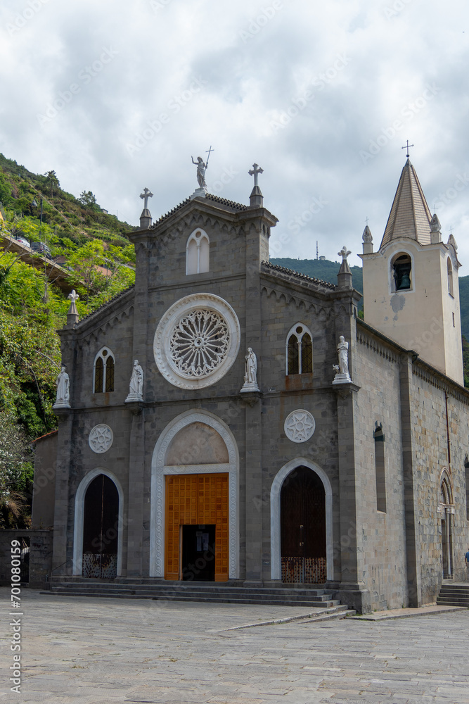 Riomaggiore, Italy, July 29, 2023. The church of San Giovanni Battista. This basilica, dedicated to the patron saint of the village, is located in the upper part of the historic center